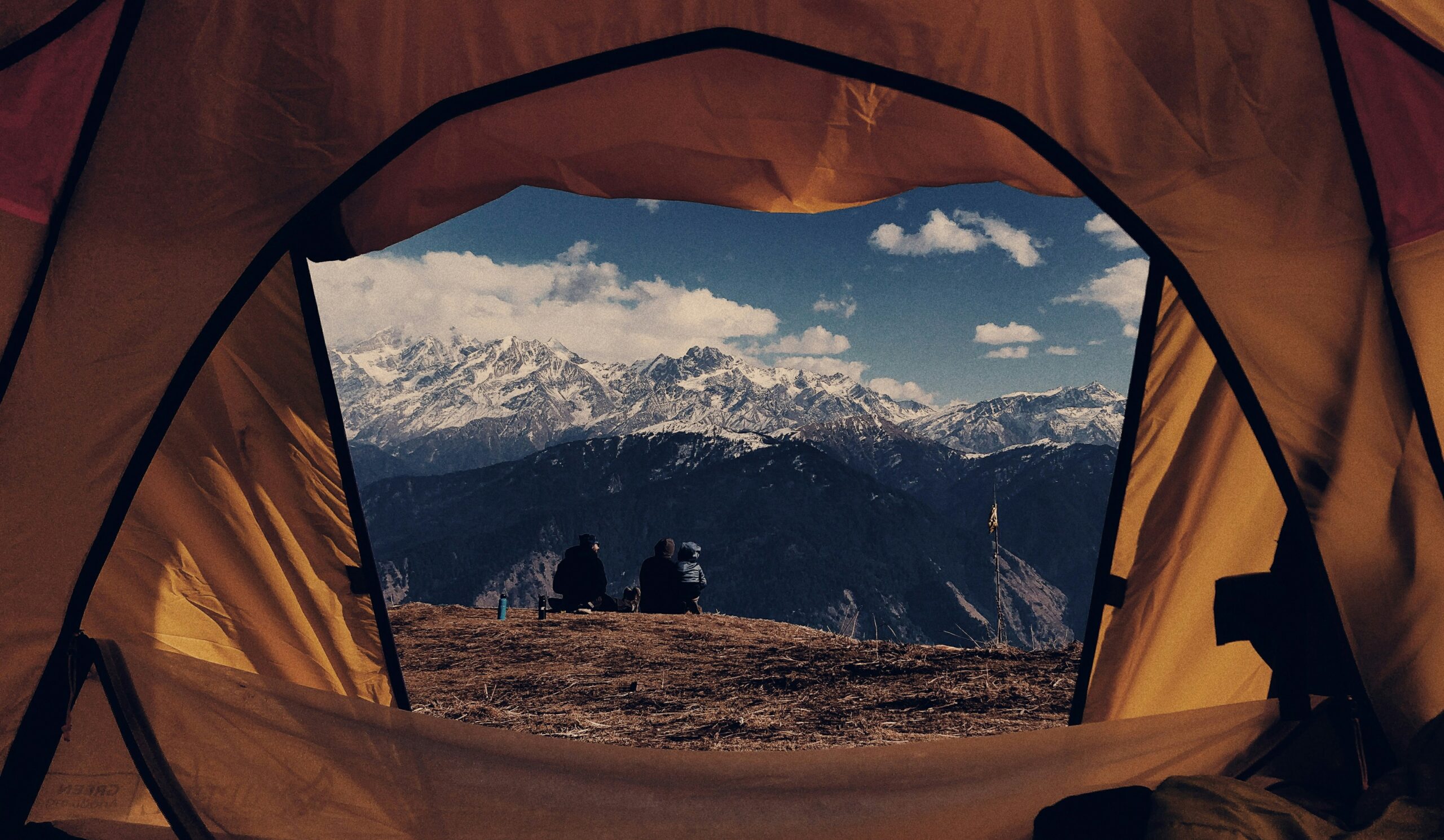 Beautiful view from the tent showcasing nature's landscape at sunrise.